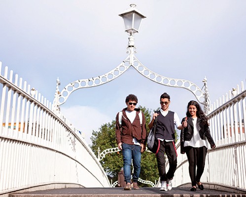 Trinity College Dublin students walking on campus