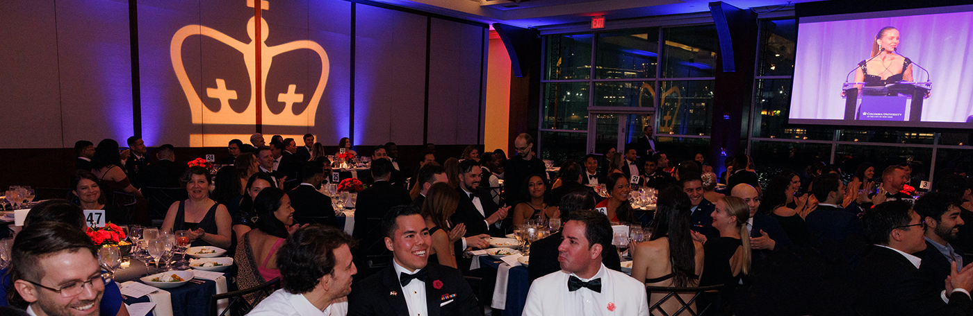 Wide shot of guests enjoying dinner at the 2022 Military Ball