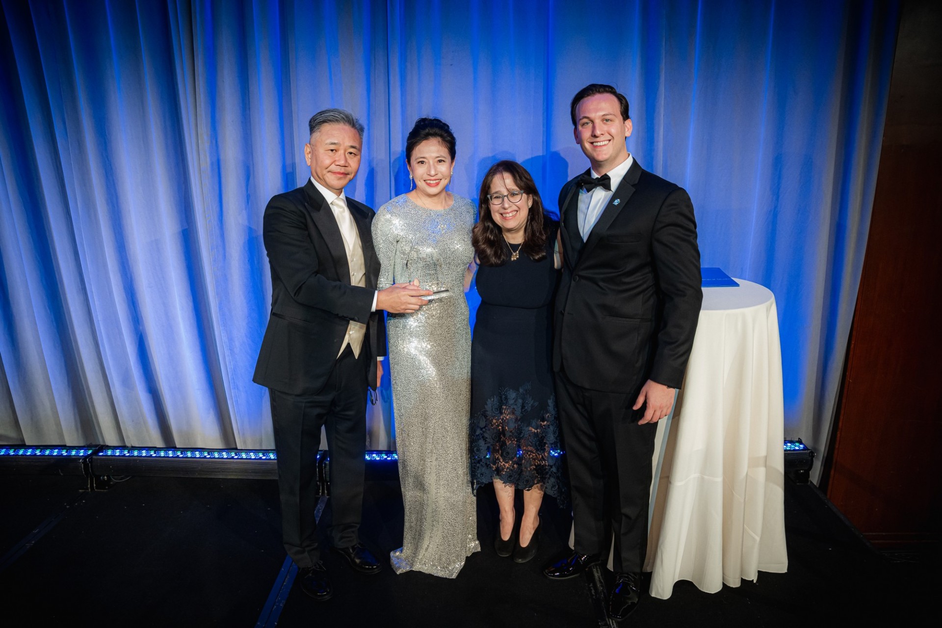 Honorees Walter and Shirley Wang with Dean Lisa Rosen-Metsch and MilVets President John Graziano