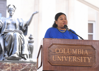 Dean of Students Marlyn Delva addresses the audience Dean of Students, Marlyn Delva