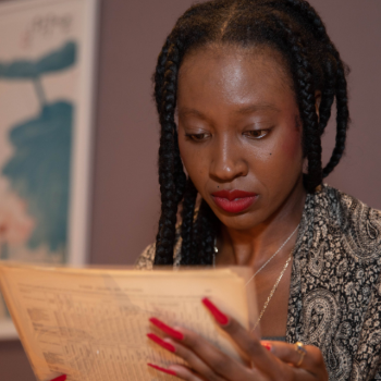 Bérénice Sylverain reading in Columbia’s Rare Book & Manuscript Library. Photo by Christian Balmer.