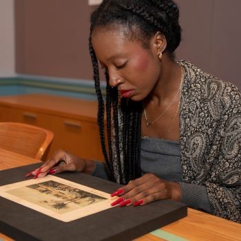 Bérénice Sylverain reading in Columbia’s Rare Book & Manuscript Library. Photo by Christian Balmer.