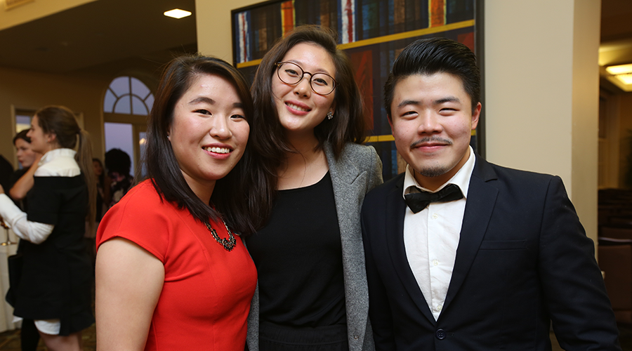 Three attendees to the 2017 GS Honor Society Induction Ceremony pose for a photo.