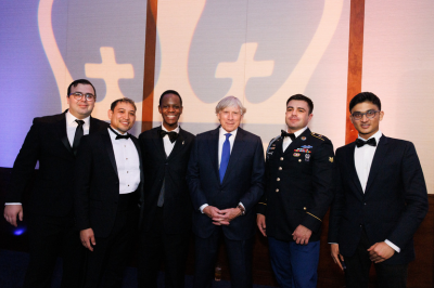 Columbia University President Emeritus Lee C. Bollinger with guests at the 2022 military ball