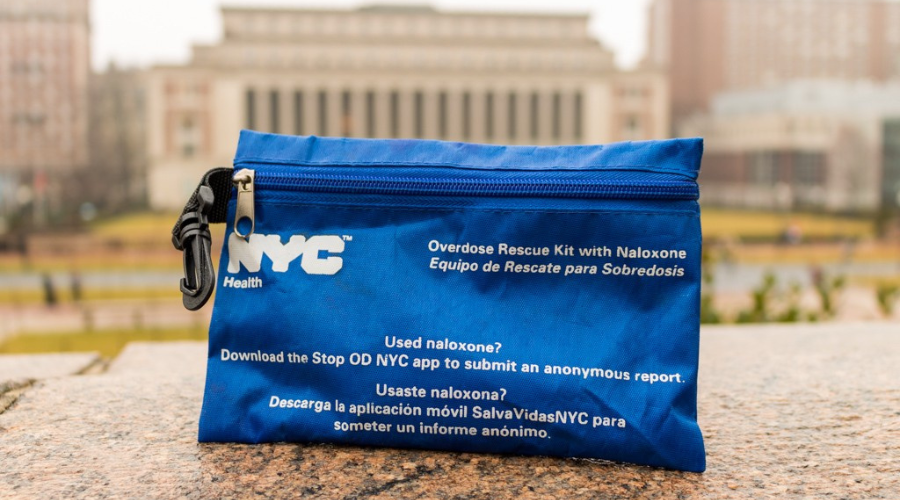 A naloxone overdose rescue kit photographed in front of Columbia's College Walk and Butler library 