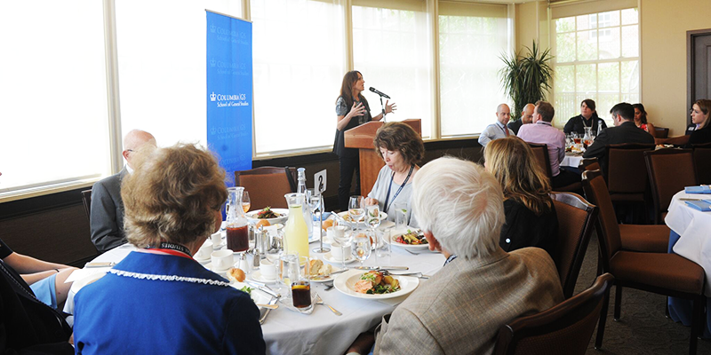 Donna MacPhee addresses Dean Luncheon attendees