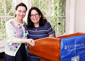 Allison Fillmore '97, Chair of the GS Board of Visitors, and Dean Lisa Rosen-Metsch '90 at the Breakfast Celebrating Anniversary Years Alumnae Allison Fillmore '97 and Dean Rosen-Metsch '90 pose for a photo at the podium