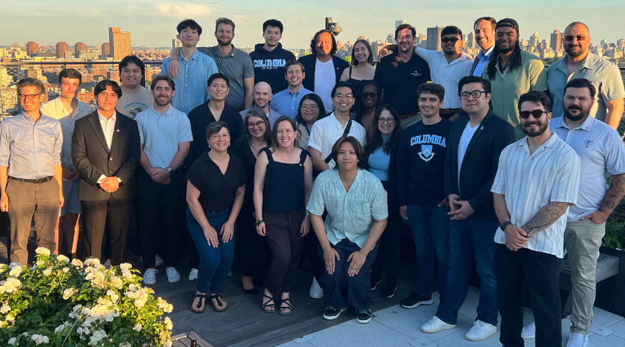 2025 Warrior-Scholar Project Columbia University cohort posing for a photo on a roomtop on campus.