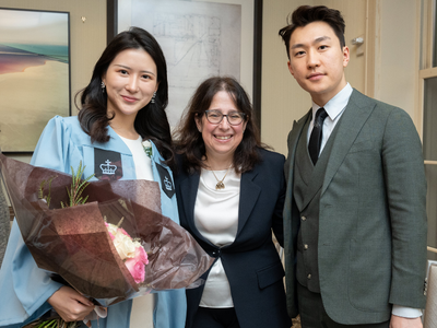 Dean Lisa Rosen-Metsch with two attendees at the February Student graduation reception