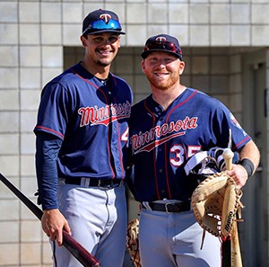 Benjamin Rodriguez, former baseball player for the Minnesota Twins, poses with a teammate