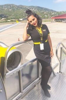 Columbia GS student Raysa Schumacher working as a flight attendant.