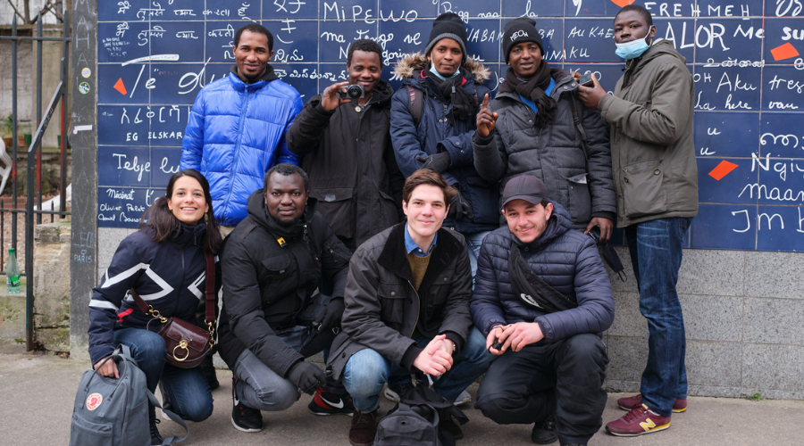 Dual BA student Joseph Aimard with members of his “Within and Without: Gazing Through the Migrant’s Lens” team