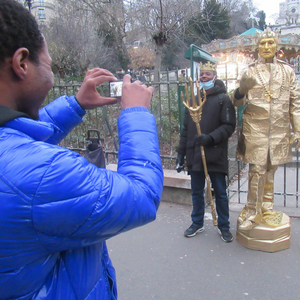 Participants in “Within and Without: Gazing Through the Migrant’s Lens” taking a photo