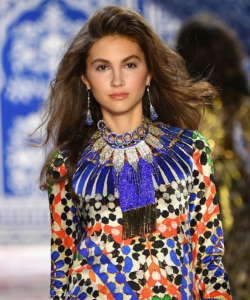 GS student, model Krista Nina Kalaj, walking a fashion runway