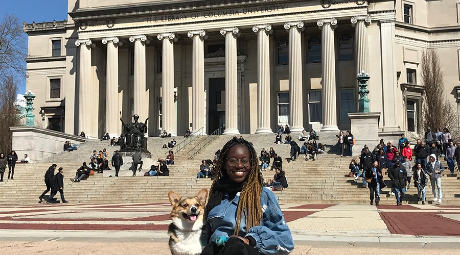 Randee Howard, GS Student, sits in front of Low Library on CU campus