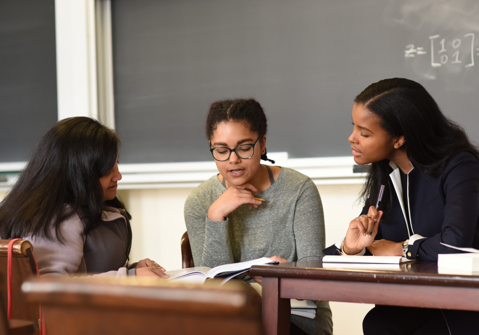 Students studying at a table