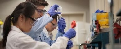 Students working in a lab.