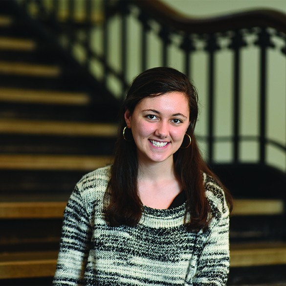 Photo of student sitting on the stairs