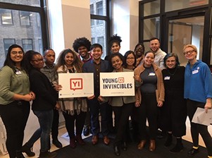 Paola Cruz (center) pictured with Young Invincibles (YI) group.