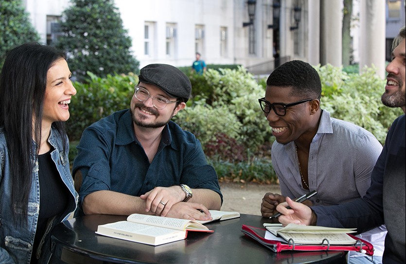 Students socializing outside on campus.