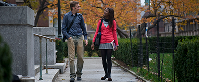 Two Columbia students walking on campus