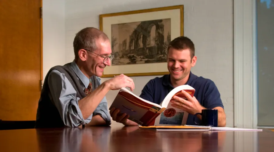 Andrew Sunshine advising a student