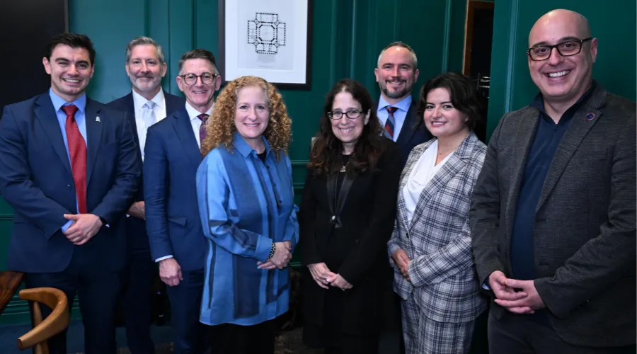 A group photo with Columbia University President Jennifer L. Mnookin in the center at the inaugural NYC Consortium for Veteran and Military-Connected Student Support.