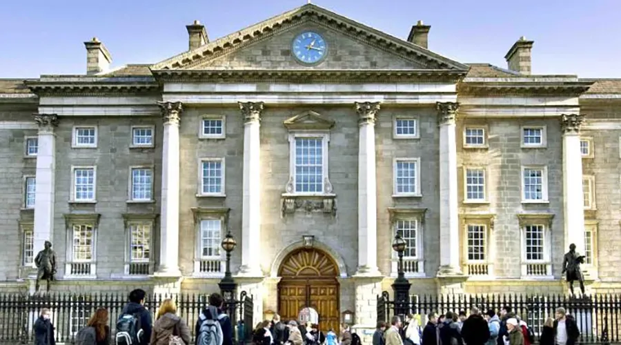 Students gather around a Trinity College building 
