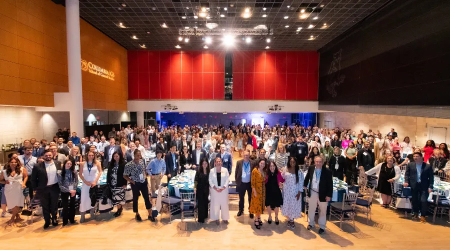 Group photo from the annual GS Reunion Dinner in Lerner Hall’s Roone Arledge Auditorium
