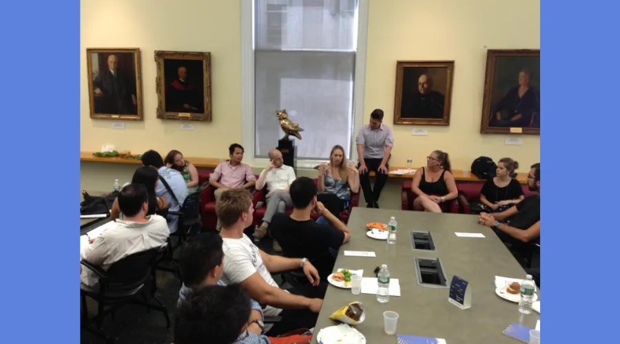 Students and alumni gather in the lounge GS