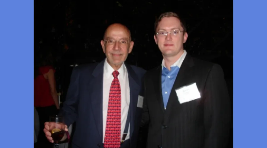 GS alumnus poses for a photo with Dean Awn 