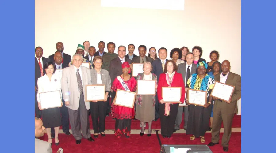Diane (in red jacket, 3rd from right, front row) at the Ambassadors for Peace Ceremony 