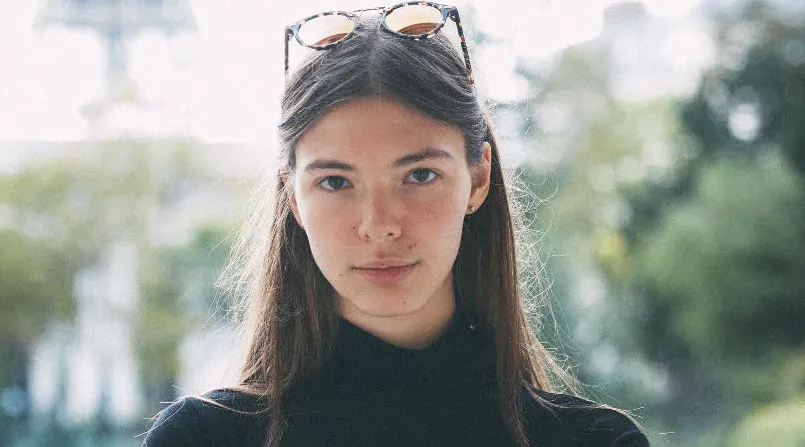 Headshot of Dorothee Grant with sunglasses on her head