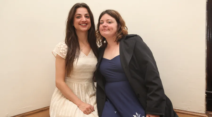 Lizzie Valverde and Katy Olson pose for a photo