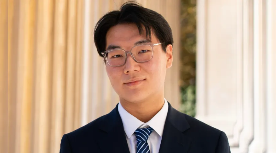 Lochlan Zhang '25GS headshot. 