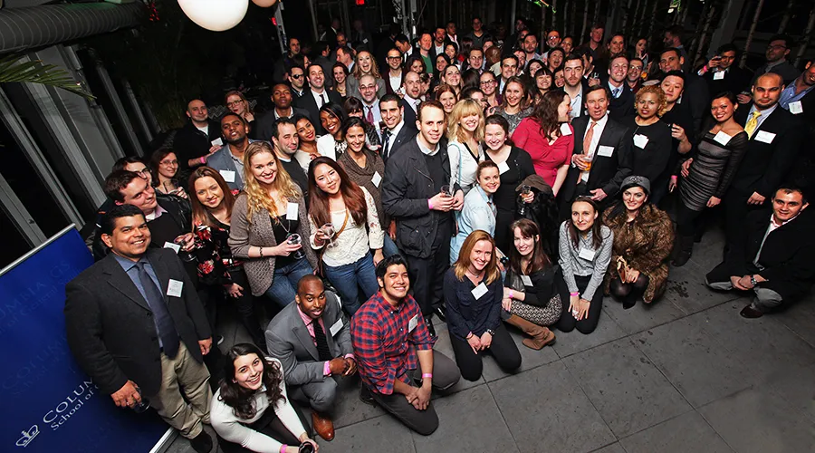 Event attendees pose for the camera