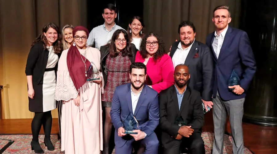 Students pose with their awards alongside Dean Lisa Rosen-Metsch and Dean of Students Ivonne Rojas