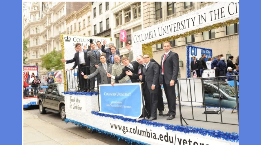 GS students ride on a parade float during the Veterans Day Parade 
