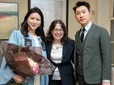 Dean Lisa Rosen-Metsch with two attendees at the February Student graduation reception