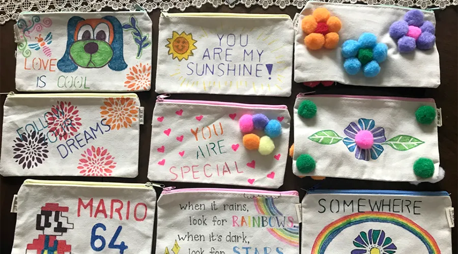 Nine customized pencil cases are displayed. each with their own individual design 