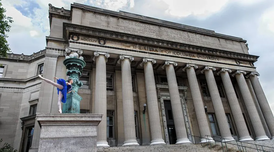 Carrie Walsh strikes a pose in front of Low Memorial Library
