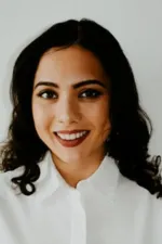  Soraya Beheshti ‘19GS photographed in front of a white wall