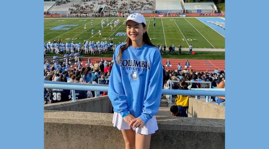 Alexandra Ling '25GS in the stands at a Columbia football game