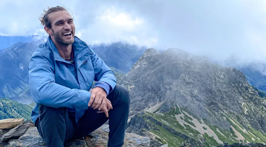 James Gasper '24GS pictured in the midst of a hike in Taiwan