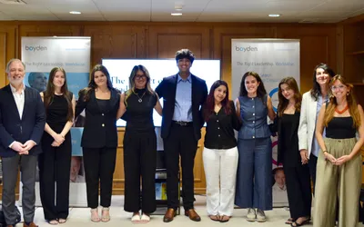 GS student Iris Tang (fourth from left) with her team at Boyden consulting.