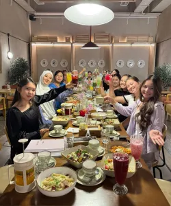 Kel Chai Ich participants pose for a photo at dinner
