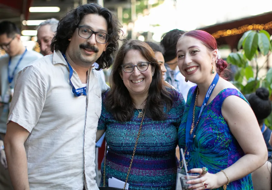 Dean Lisa Rosen-Metsch '90GS with two GS alumni.