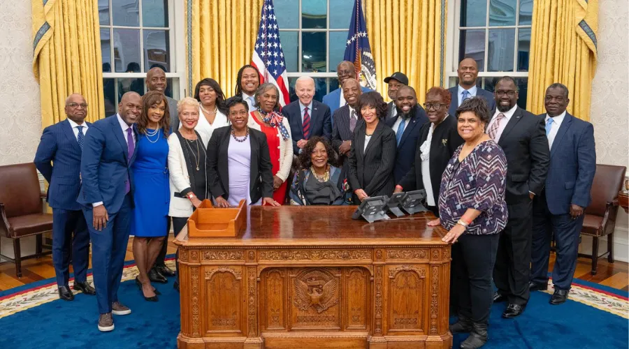 Denise Louise Pease '83GS (center, seated) with President Joe Biden and the members of the Biden administration’s Advisory Commission on Advancing Educational Equity, Excellence, and Economic Opportunity for Black Americans