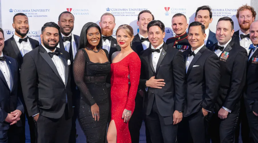 Group of veterans and guests posing at the 2023 military ball 