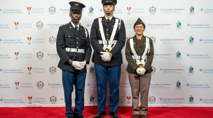 Three people in military dress at the 2024 military ball